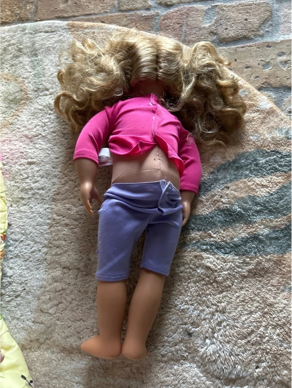 Our Generation Blonde Curly Hair Doll with Pink Top and Purple Pants